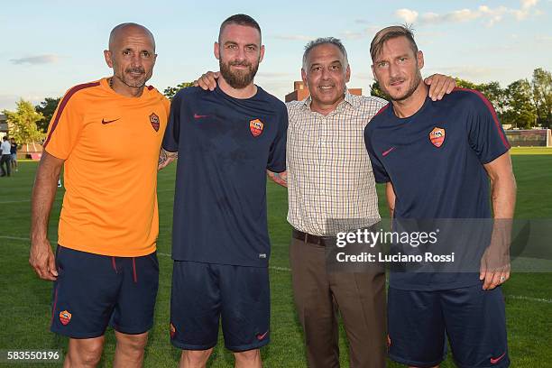 Luciano Spalletti, Daniele De Rossi, James Pallotta and Francesco Totti after an AS Roma training at Ohiri Field on July 26, 2016 in Cambridge,...