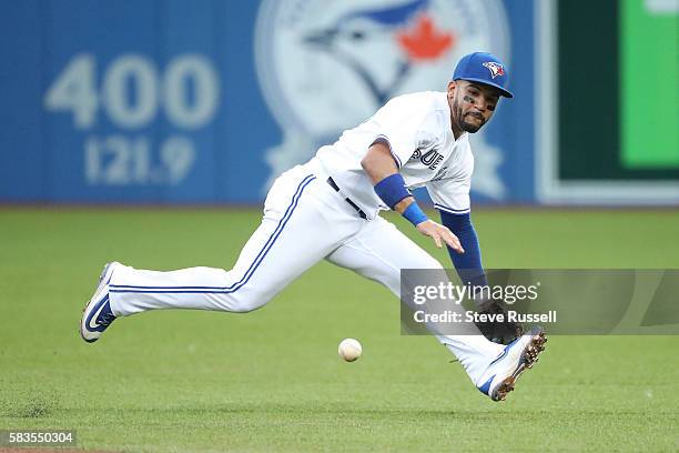 Toronto Blue Jays second baseman Devon Travis tracks down a Alex Dickerson ground ball as the Toronto Blue Jays play the San Diego Padres at the...