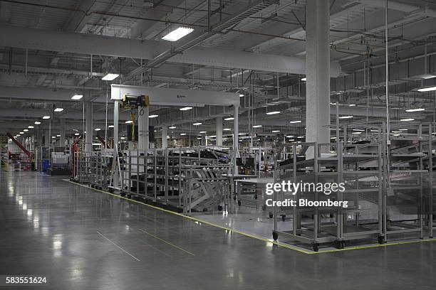 Machinery stands inside the Tesla Motor Inc. Gigafactory in Sparks, Nevada, U.S., on Tuesday, July 26, 2016. Tesla officially opened its Gigafactory...