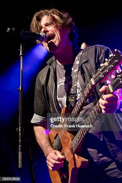 Singer Eric Bazilian of the American band The Hooters performs live during a concert at the Columbia Theater on July 26, 2016 in Berlin, Germany.