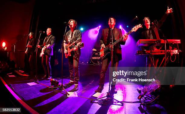 Tommy Williams, John Lilley, Eric Bazilian, Fran Smith, Jr. And Rob Hyman of the American band The Hooters perform live during a concert at the...