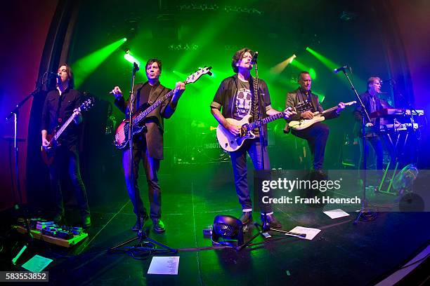 Tommy Williams, Fran Smith, Jr., Eric Bazilian, John Lilley and Rob Hyman of the American band The Hooters perform live during a concert at the...