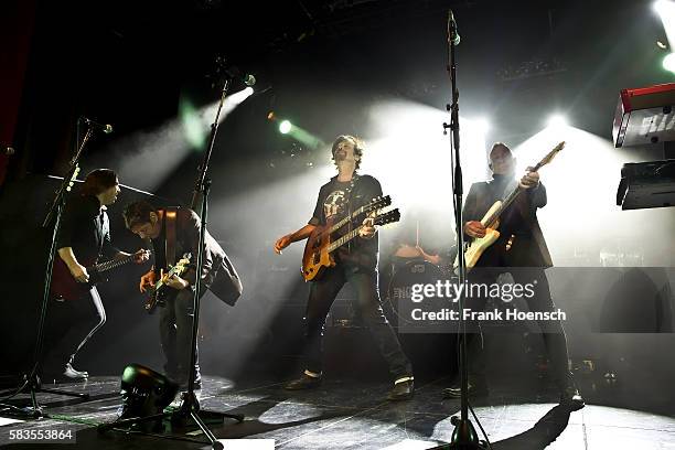 Tommy Williams, Fran Smith, Jr., Eric Bazilian and John Lilley of the American band The Hooters perform live during a concert at the Columbia Theater...