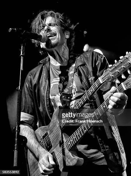 Singer Eric Bazilian of the American band The Hooters performs live during a concert at the Columbia Theater on July 26, 2016 in Berlin, Germany.