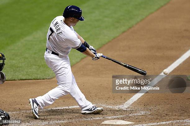 Jake Elmore of the Milwaukee Brewers hits a single during the fourth inning against the Arizona Diamondbacks at Miller Park on July 26, 2016 in...
