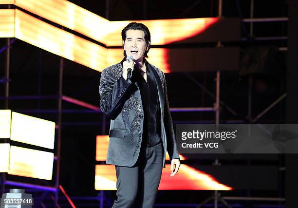Singer Fei Xiang aka Kris Phillips performs onstage during the welcome party of 2016 Sichuan International Culture Tourism Festival on July 26, 2016...