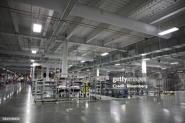 Machinery stands inside the Tesla Motors Inc. Gigafactory in Sparks, Nevada, U.S., on Tuesday, July 26, 2016. Tesla officially opened its Gigafactory...