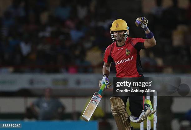 Gros Islet , Saint Lucia - 26 July 2016; Trinbago Knight Riders Umar Akmal celebrates victory during the Hero Caribbean Premier League Match 24...