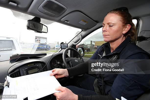 Animal Management Officer Kirsten checks on the next location on July 27, 2016 in Auckland, New Zealand. The Auckland Council Animal Control...