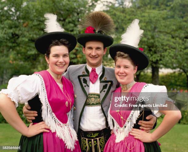 germans in traditional bavarian dress - bavaria traditional stock pictures, royalty-free photos & images