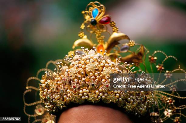 woman in traditional malay headdress - headdress stock pictures, royalty-free photos & images