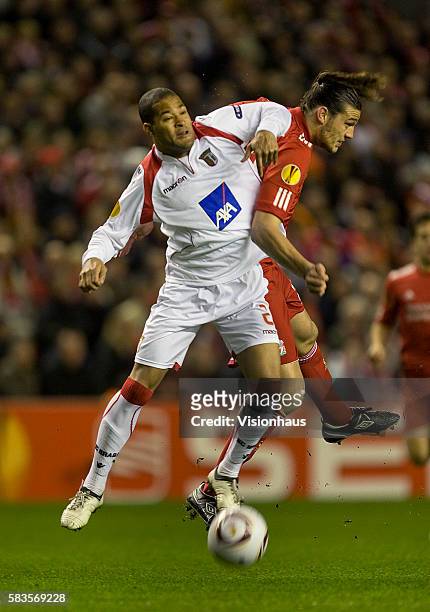 Andy Carroll of Liverpool and Alberto Rodriguez of SC Braga during the UEFA Europa League Round of 16, 2nd Leg match between Liverpool and SC Braga...