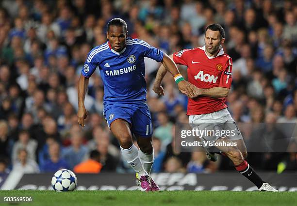 Didier Drogba of Chelsea and Ryan Giggs of Manchester United during the UEFA Champions League Quarter Final match between Chelsea and Manchester...