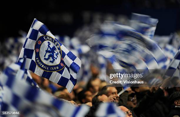 Chelsea fans waving flags before the UEFA Champions League First Knock-out Round, 2nd Leg match between Chelsea and Napoli at Stamford Bridge in...