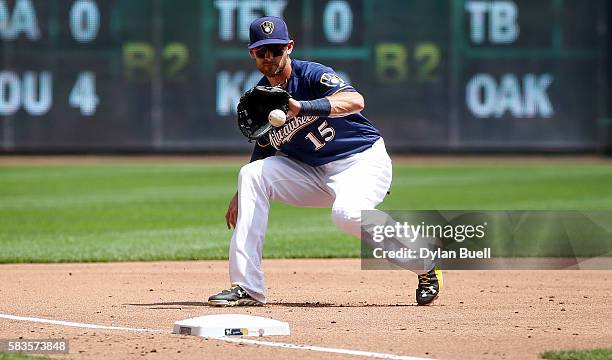 Will Middlebrooks of the Milwaukee Brewers fields a ground ball in the second inning against the Chicago Cubs at Miller Park on July 24, 2016 in...