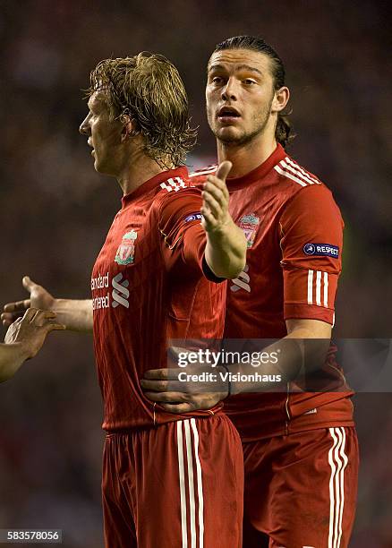 Andy Carroll and Dirk Kuyt of Liverpool during the UEFA Europa League Round of 16, 2nd Leg match between Liverpool and SC Braga at Anfield Stadium in...