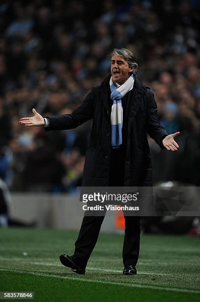 Manchester City coach Roberto Mancini during the UEFA Europa League round of 16 match between Manchester City and Sporting Lisbon at the Etihad...