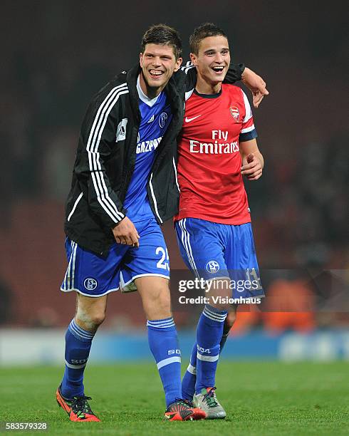 Goalscorers Klaas-Jan Huntelaar and Ibrahim Afellay of FC Schalke 04 celebrate victory over Arsenal after the UEFA Champions League Group B match...