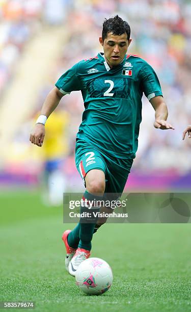 Israel Jimenez of Mexico in action during the Mens Soccer Final between Brazil and Mexico as part of the 2012 London Olympic Summer Games at Wembley...