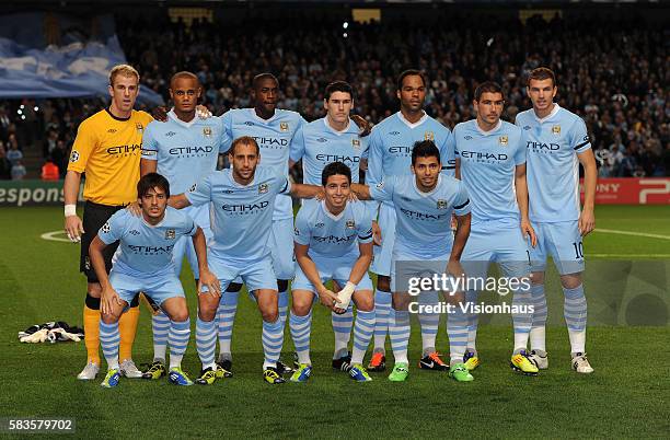 Manchester City players pose for a team photograph during the UEFA Champions League Group A match between Manchester City and SSC Napoli at the...