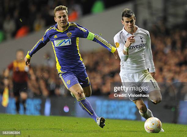 Gareth Bale of Tottenham Hotspur and Aleš Mertelj of NK Maribor during the UEFA Europa League Group J match between Tottenham Hotspur and NK Maribor...