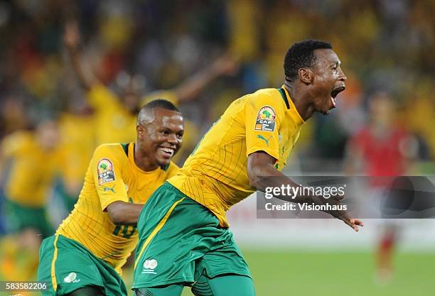 Siyabonga Sangweni of South Africa celebrates his goal wiith Thulani Serero during the 2013 African Cup of Nations Group A match between South Africa...