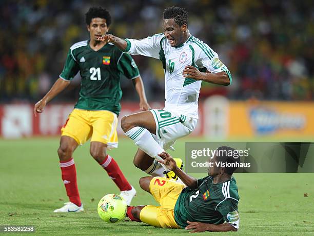 Degu Debebe of Ethiopia and John Obi Mikel of Nigeria during the 2013 African Cup of Nations Group C match between Ethiopia and Nigeria at the...