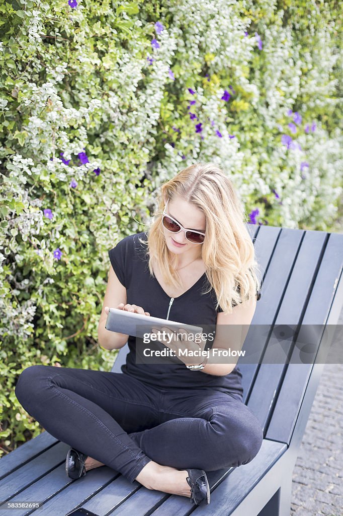 Young woman using a tablet device