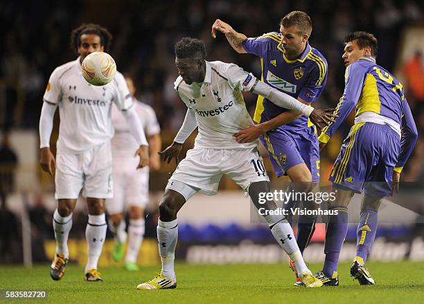 Emmanuel Adebayor of Tottenham Hotspur and Željko Filipovic and Arghus of NK Maribor during the UEFA Europa League Group J match between Tottenham...