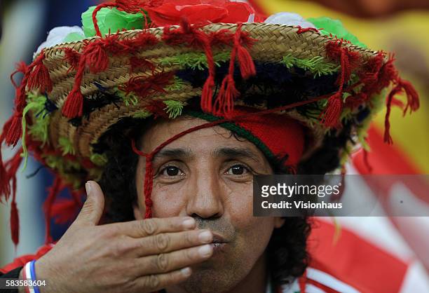 Colourful Morocco fans during the 2013 African Cup of Nations Group A match between South Africa and Cape Verde at the Soccer City Stadium in...