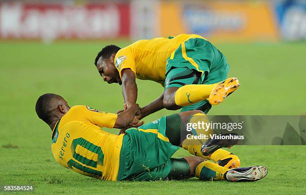 Siyabonga Sangweni of South Africa celebrates his goal wiith Thulani Serero during the 2013 African Cup of Nations Group A match between South Africa...