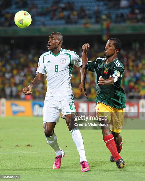 Degu Debebe of Ethiopia and Brown Ideye of Nigeria during the 2013 African Cup of Nations Group C match between Ethiopia and Nigeria at the...