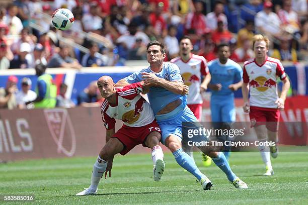 Frank Lampard of New York City FC challenges Aurelien Collin of New York Red Bulls during the New York Red Bulls Vs New York City FC MLS regular...