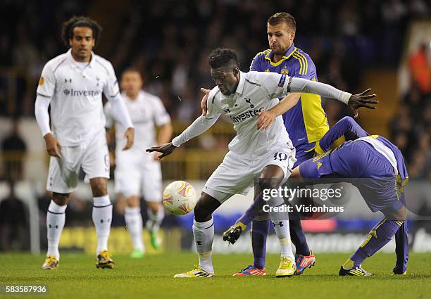 Emmanuel Adebayor of Tottenham Hotspur and Željko Filipovic and Arghus of NK Maribor during the UEFA Europa League Group J match between Tottenham...