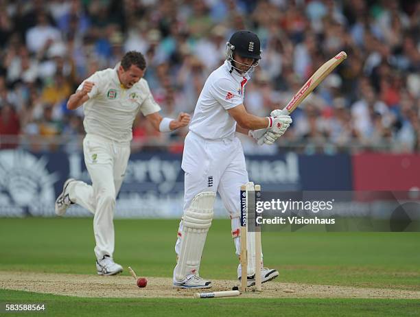 Jonathan Trott of England is bowled by Peter Siddle of Australia during Day One of the 1st Investec Ashes Test between England and Australia at Trent...