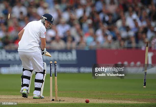 Jonny Bairstow of England is bowled by Mitchell Starc of Australia during Day One of the 1st Investec Ashes Test between England and Australia at...