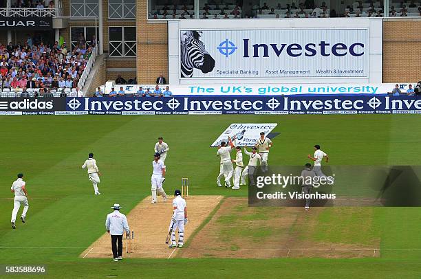 Australia celebrate as James Pattinson takes the wicket of England Captain Alastair Cook during Day One of the 1st Investec Ashes Test between...