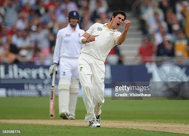 Mitchell Starc of Australia celebrates bowling Jonny Bairstow of England during Day One of the 1st Investec Ashes Test between England and Australia...