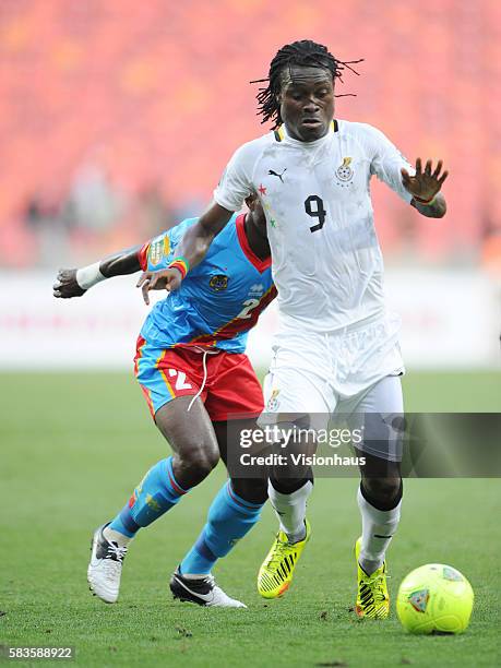 Derek Boateng of Ghana and Djo Issama Mpeko of DR Congo during the 2013 African Cup of Nations Group B match between Ghana and DR Congo at the Nelson...