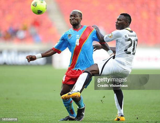 Kwadwo Asamoah of Ghana and Patou Kabangu Mulota of DR Congo during the 2013 African Cup of Nations Group B match between Ghana and DR Congo at the...