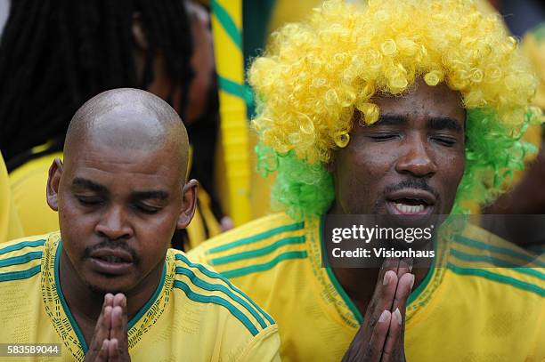 Colourful South Africa fans during the 2013 African Cup of Nations Group A match between South Africa and Cape Verde at the Soccer City Stadium in...