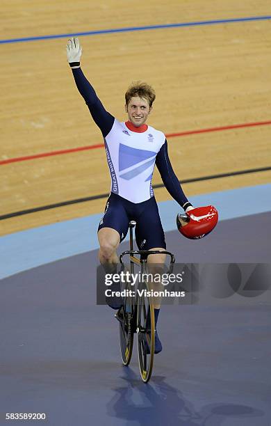 Jason Kenny of Great Britain celebrates beating Gregory Bauge of France in the Gold Medal race of the Mens Sprint during the Track Cycling as part of...