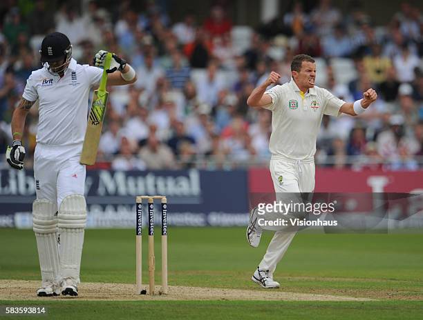 Peter Siddle of Australia celebrates taking the wicket of Kevin Pietersen of England during Day One of the 1st Investec Ashes Test between England...