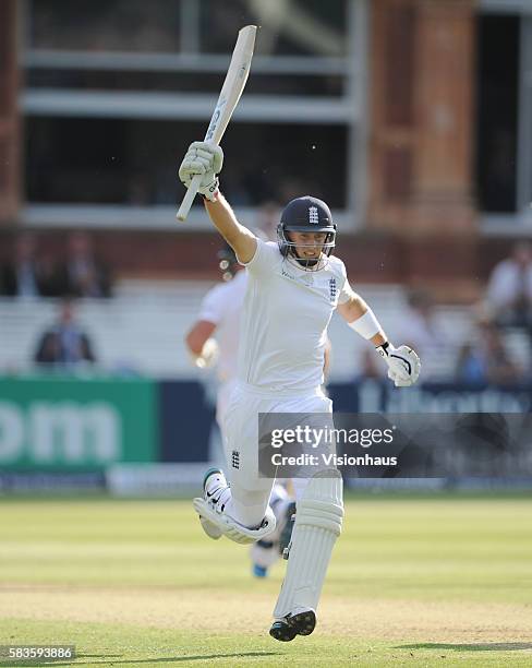 Joe Root of England celebrates his century during Day One of the 1st Investec Test between England and Sri Lanka at Lord's Cricket Ground in London,...