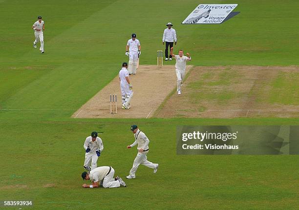 Peter Siddle of Australia celebrates taking the wicket of Ian Bell of England - caught by Shane Watson - during Day One of the 1st Investec Ashes...