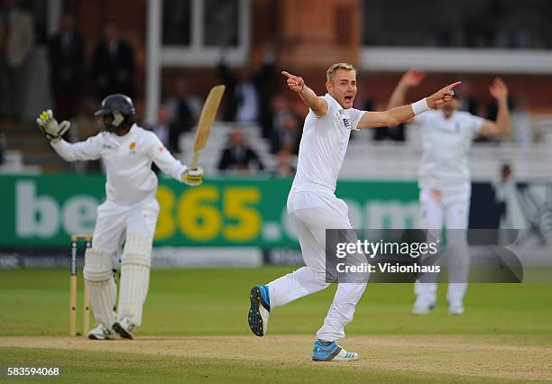 Stuart Broad of England successfully appeals for the wicket of Nuwan Pradeep, only for the decision to be reversed when Pradeep appealed during Day...