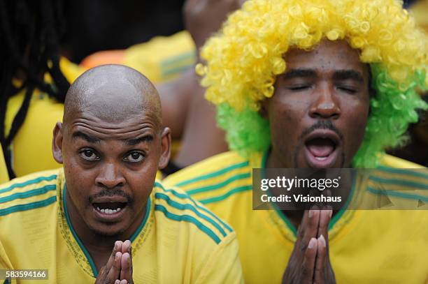Colourful South Africa fans during the 2013 African Cup of Nations Group A match between South Africa and Cape Verde at the Soccer City Stadium in...