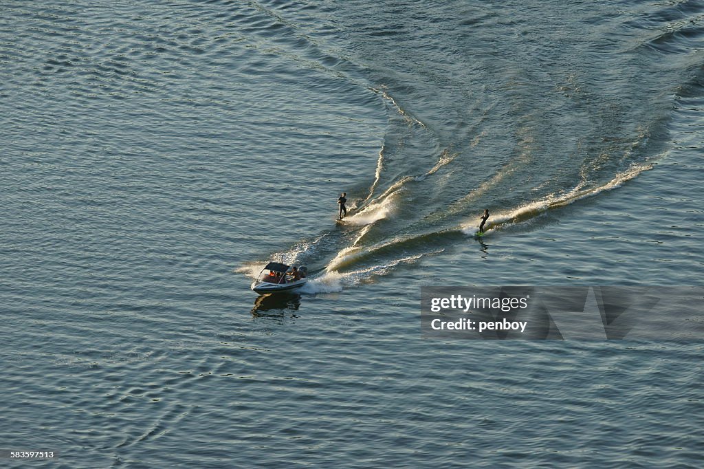 Waterskiing of two skiers