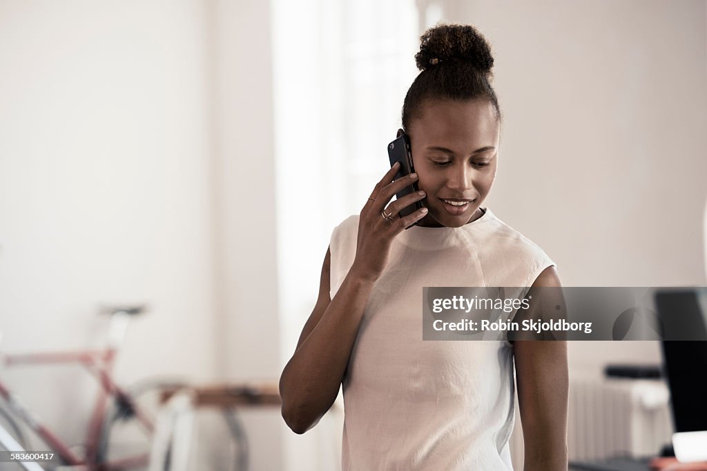 Young Woman speaking on mobile phone