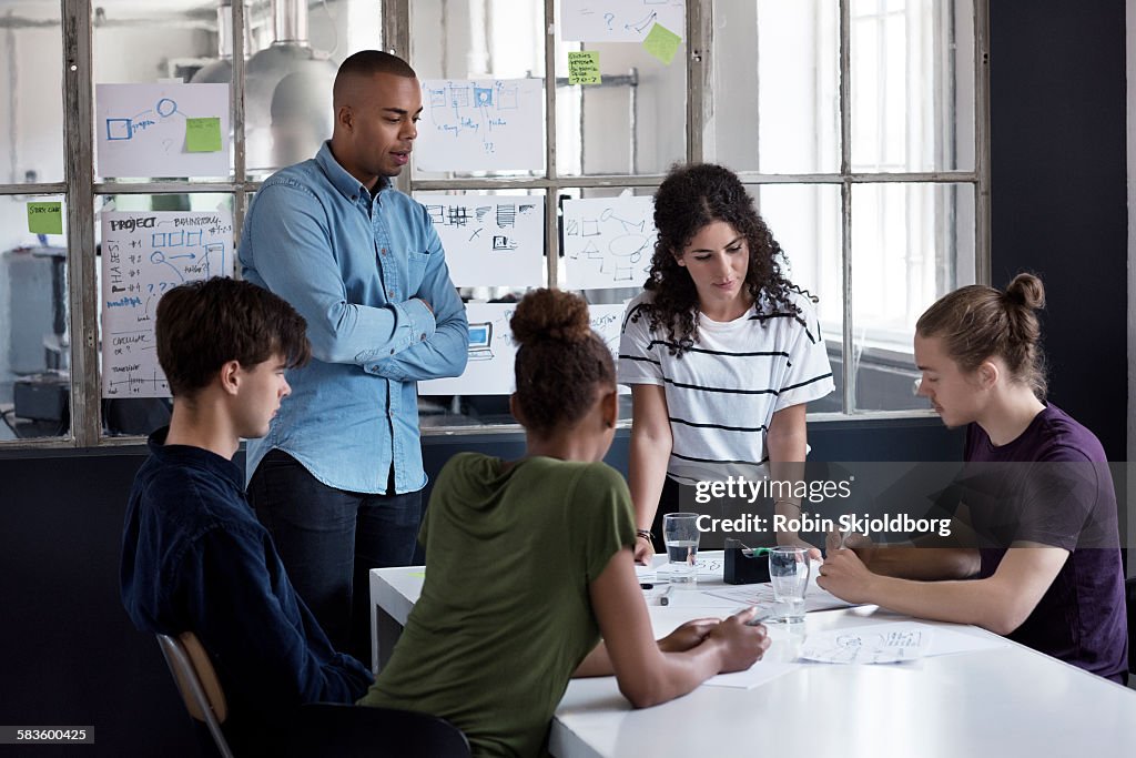 Young people having meeting